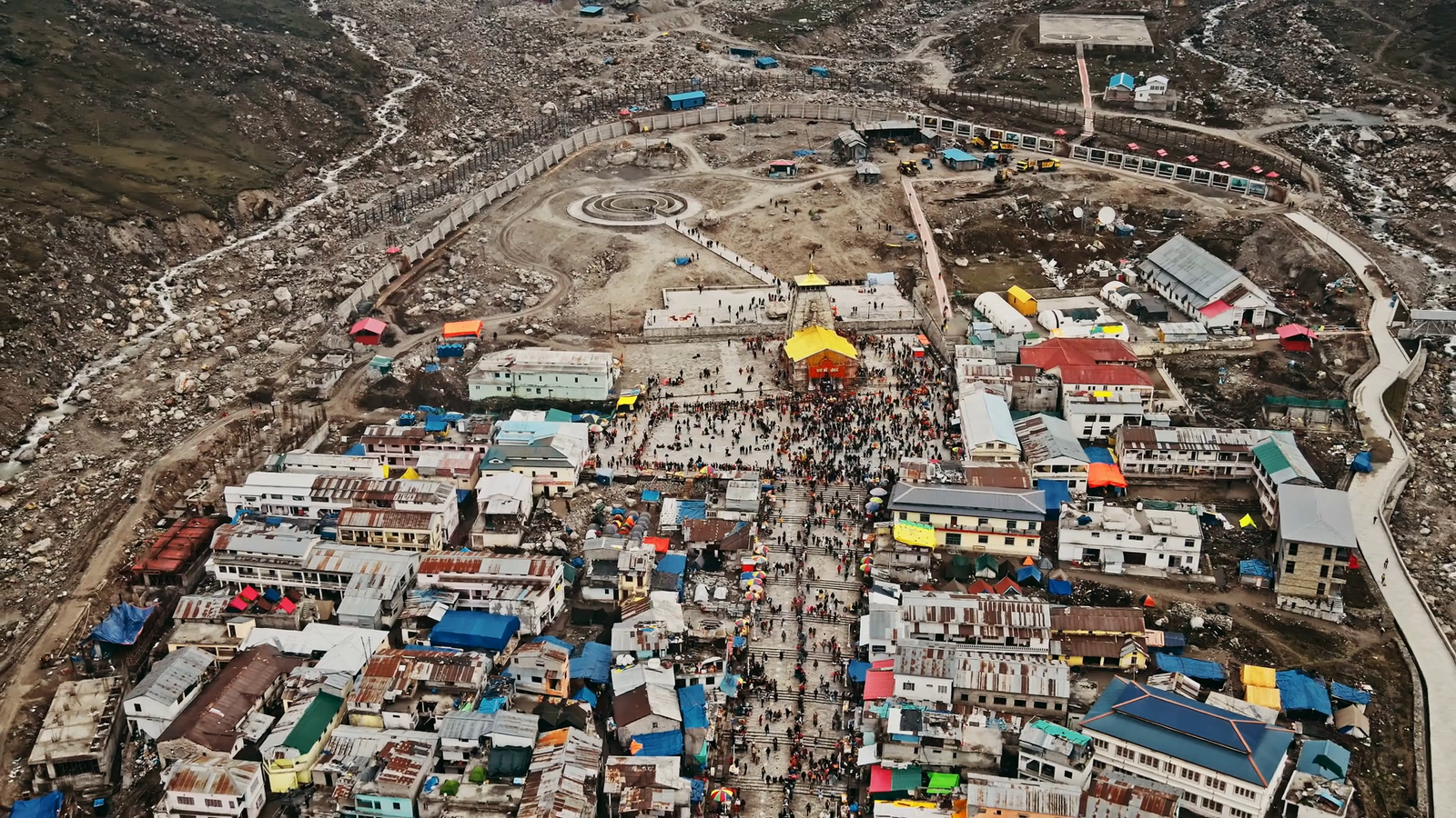 https://dm0qx8t0i9gc9.cloudfront.net/thumbnails/video/S3Y0J7dQvkeg08nbn/videoblocks-aerial-view-of-kedarnath-temple-uttarakhand-india-6_svbarsvup_thumbnail-1080_01.png